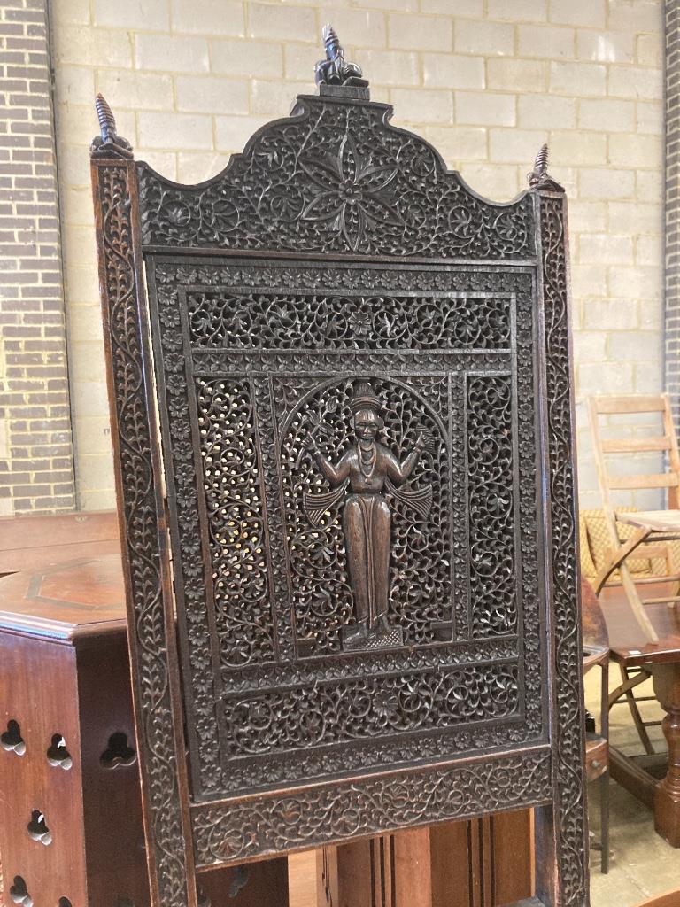 A 19th century Burmese carved hardwood side chair, width 55cm, depth 48cm, height 128cm